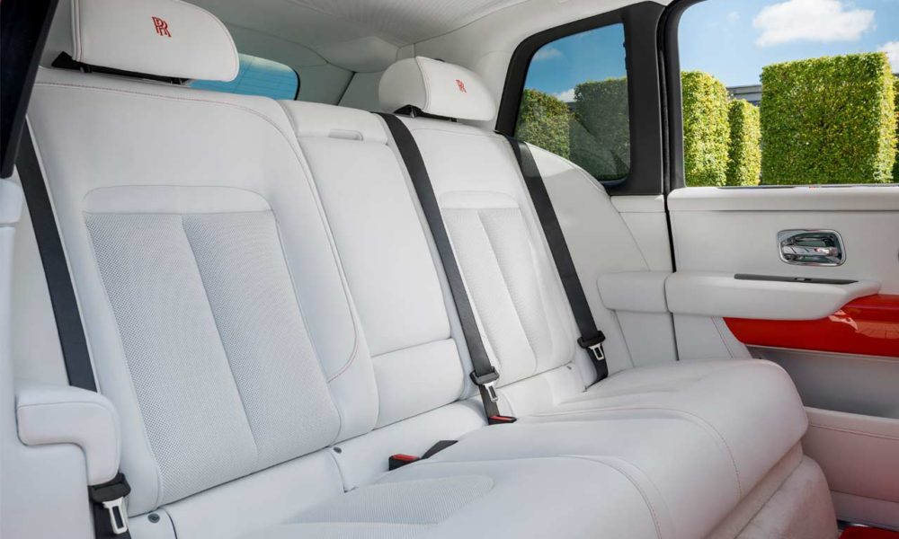 Bespoke Rolls-Royce Cullinan in Fux Orange - Interior - Rear seats