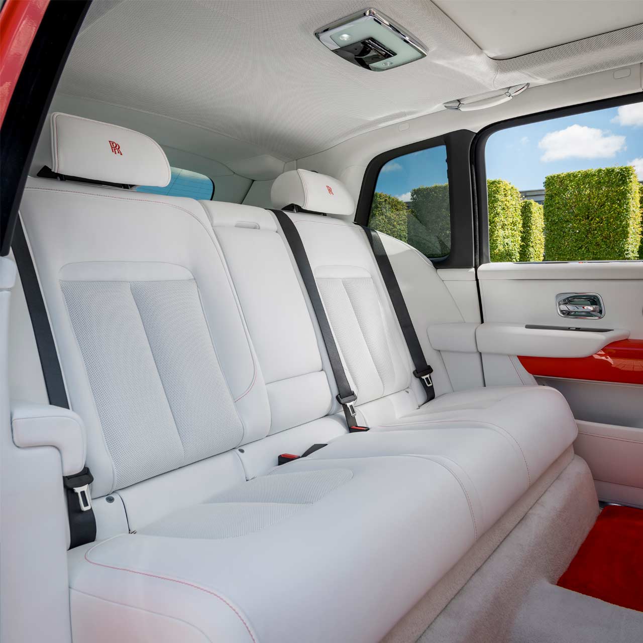 Bespoke Rolls-Royce Cullinan in Fux Orange - Interior - Rear seats