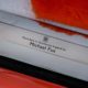 Bespoke Rolls-Royce Cullinan in Fux Orange - door sill